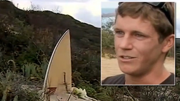 A memorial placed at Bunker Bay for the dead shark-attack victim, and inset, friend James Cottrell.