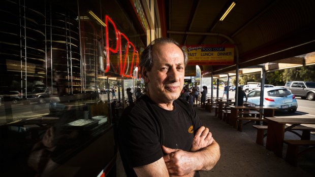 Business down 35 per cent: George's Take Away owner George Papadopoulos outside his store in Apollo Bay. 