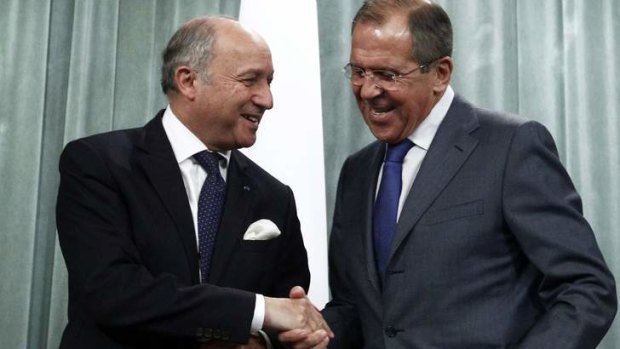 No agreement: French Foreign Minister Laurent Fabius shakes hands with his Russian counterpart Sergei Lavrov during a news conference in Moscow on Tuesday.