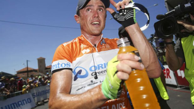 Team player: Simon Gerrans gave his Tour de France yellow jersey to teammate Daryl Impey as a sign of gratitude.