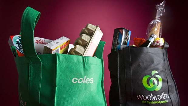 Coles and Woolworths are still under  ACCC investigation despite agreeing to a new voluntary code of conduct.