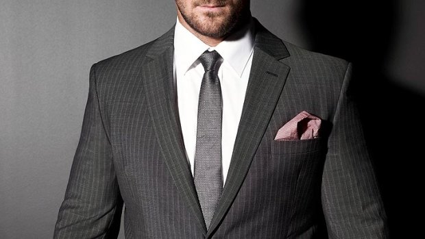 An off-the-rack suit should fit the shoulders well and not be too tight.