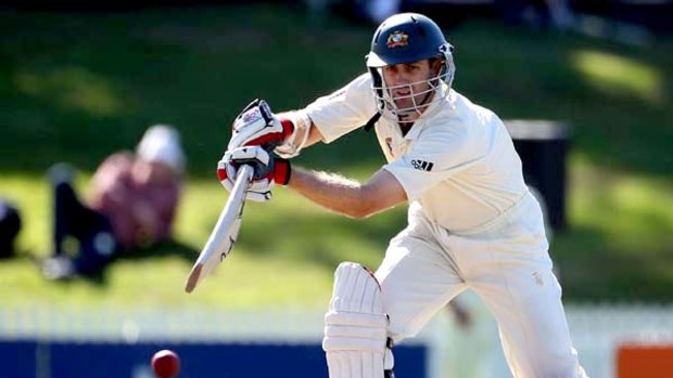Toughing it out  . . . Simon Katich has batted Australia into a strong position.