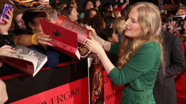 Reluctant celebrity ... Suzanne Collins at the premiere of <i>The Hunger Games: Catching Fire</i>  in Los Angeles.