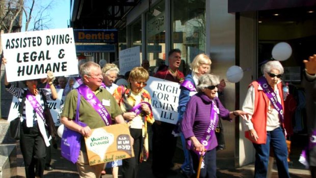 Campaigning ... Dorothy Simons, in purple,  on a pro-euthanasia march.