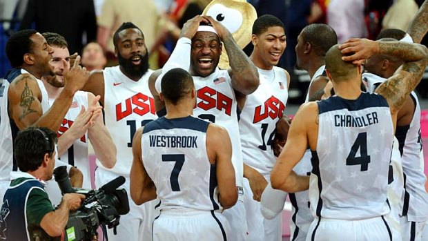 King James holds court ... LeBron James and his team celebrate their gold-medal win against a tough Spain outfit.