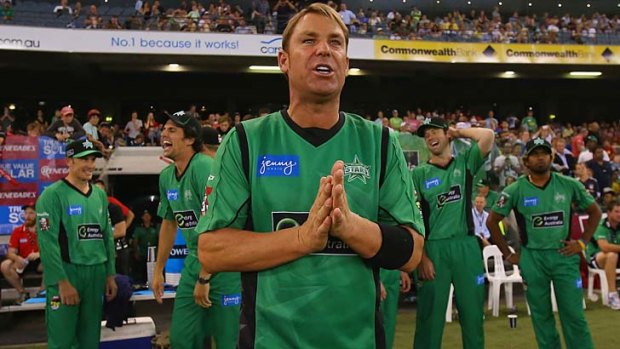 Shane Warne gets ready to lead the Stars out for the game against the Renegades.