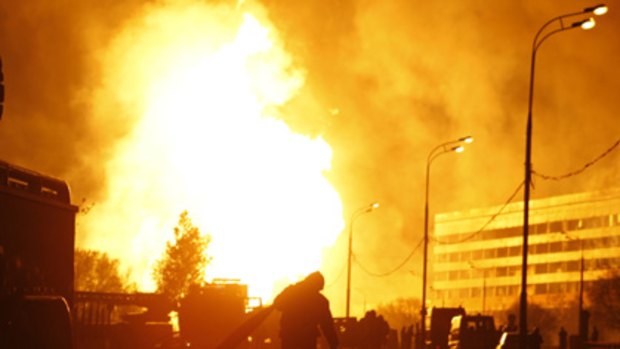 A gas pipeline exploded in southwest Moscow early on Sunday, sending flames high into the air and setting buildings and cars ablaze.