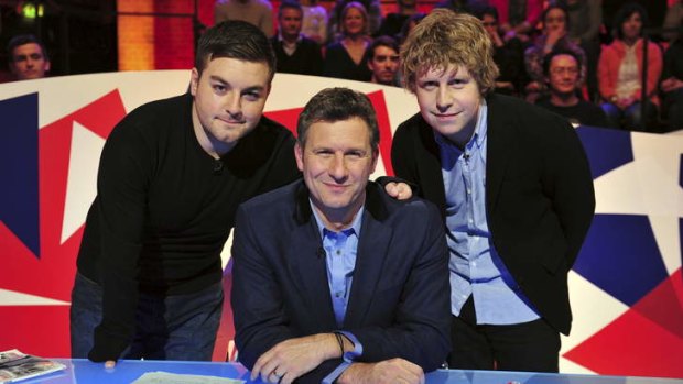 Adam Hills (centre) with Alex Brooker (left) and Josh Widdicombe on the set of <i>The Last Leg</i>.