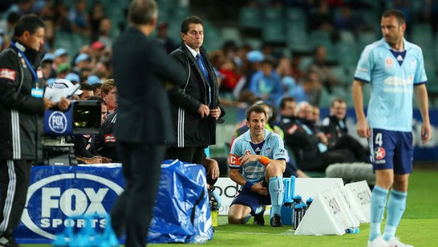 Down and out: Alessandro Del Piero nurses an injury during Saturday night's encounter with Newcastle Jets.