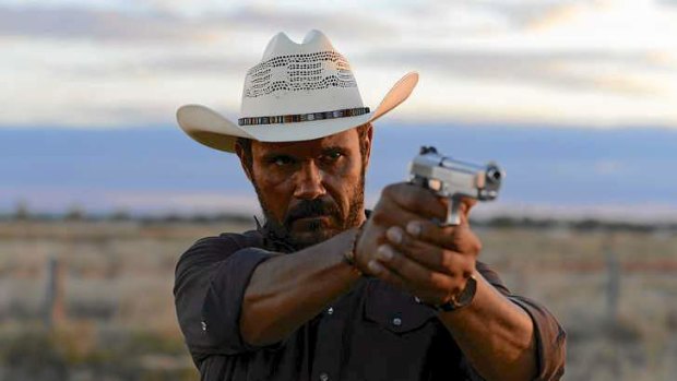 Detective Jay Swan (Aaron Pedersen), returns to his home town to find it has been taken over by the lawless, in <i>Mystery Road</i>.