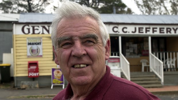 Val Jeffery outside the Tharwa store in 2003. He took over the store from his parents.
