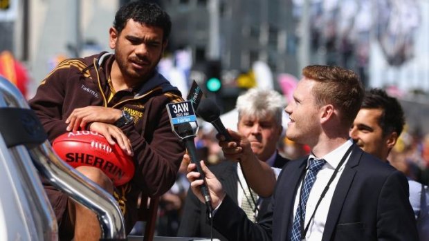 Cyril Rioli speaks to the media during the grand final parade on Friday.