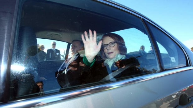 Prime Minister Julia Gillard leaves after the opening of the Hume Freeway bypass of Holbrook.
