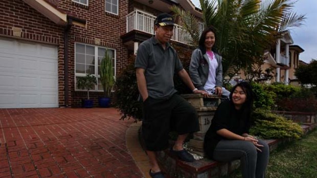 Portrait of the Praland family infront of their Richmond Cresent in Cecil Hills.