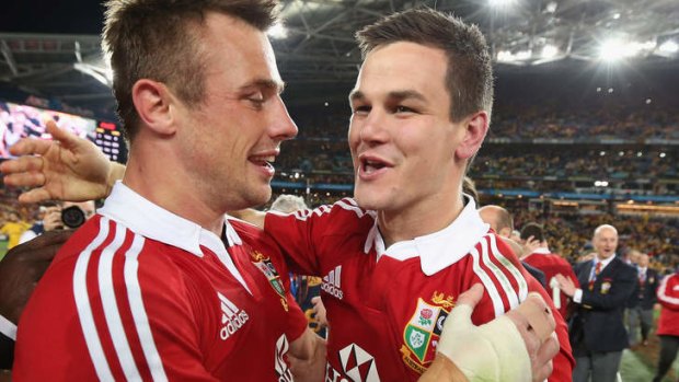 Lions five-eighth Jonathan Sexton (R) has called for changes to the rugby calendar.