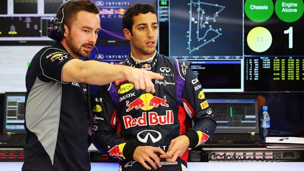Team effort: Race engineer Simon Rennie (left) advises Australian F1 driver Daniel Ricciardo.