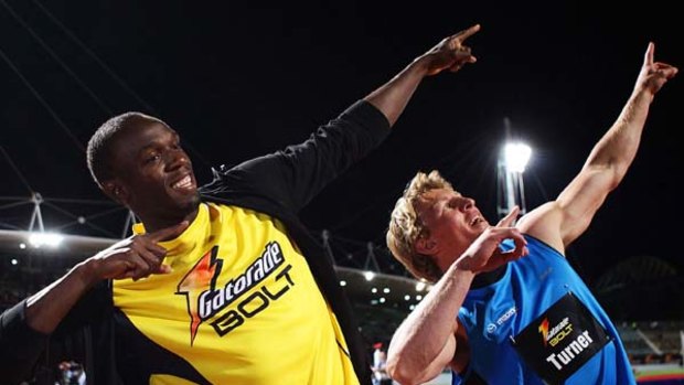 Wallaby flyer Lachie Turner poses with Usain Bolt in Sydney.