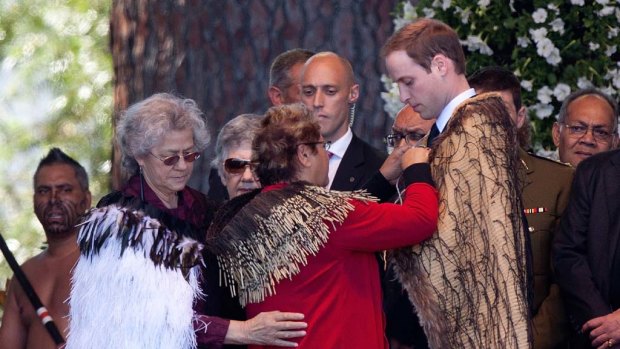 Prince William receives a Maori cloak upon arriving at the Earthquake Memorial for those who were lost in the February 22 earthquake, in Christchurch.