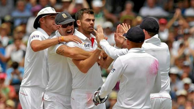 On top: James Anderson celebrates the wicket of Shane Watson.