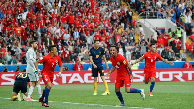 Chile's Martin Rodriguez (second right) celebrates after scoring the equaliser against Australia.
