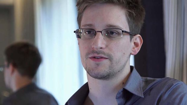 Attorney-General Senator George Brandis has excalated the government's attack on whistleblower Edward Snowden.