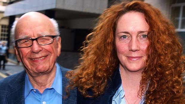 Rebekah Brooks, pictured with Chairman of News Corporation Rupert Murdoch, has been formally charged with phone hacking.