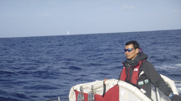 The big blue: Daniel Ho at the helm of Team Garmin on the Clipper round-the-world yacht race.