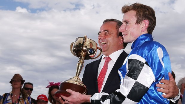 Andreas Wohler with Ryan Moore after Protectionist's Melbourne Cup win.