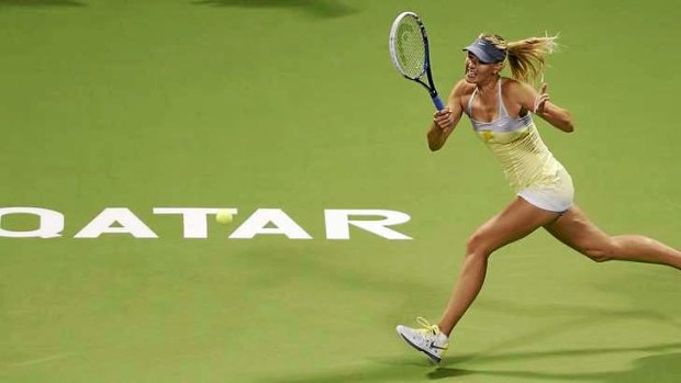 Maria Sharapova of Russia returns the ball during her victory over Klara Zakopalova of the Czech Republic.