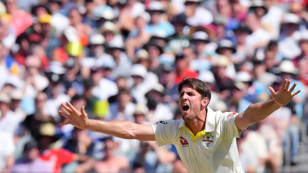 Exhortation: Mitchell Marsh appeals for a lbw decision against Alastair Cook during the Boxing Day Test.
