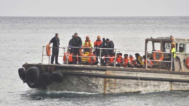 Warning ... asylum seekers arrive on Christmas Island.