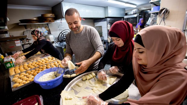 Dallal Neeman, Abdul Neeman, Fatima El-Kabbout and Nurah Neeman bake thousands of sweets for Ramadan. 