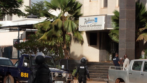 Mali police outside the Radisson Blu hotel after an attack by gunmen in November 2015.