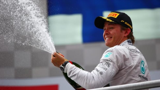 Nico Rosberg sprays the bubbly after his win in the German Grand Prix on Sunday.