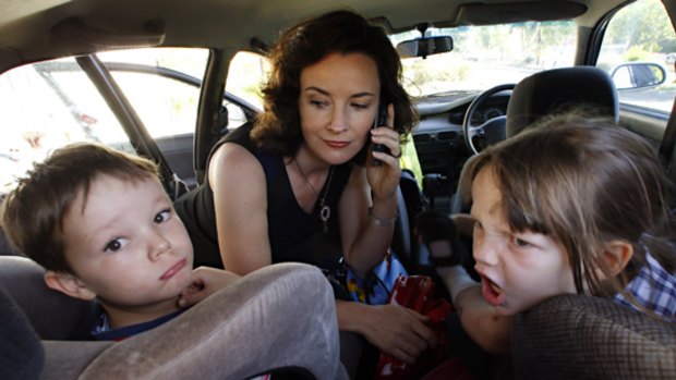 Giulia Baggio, with children Alessandra and James, gets stressed about the amount of time she spends in her car.