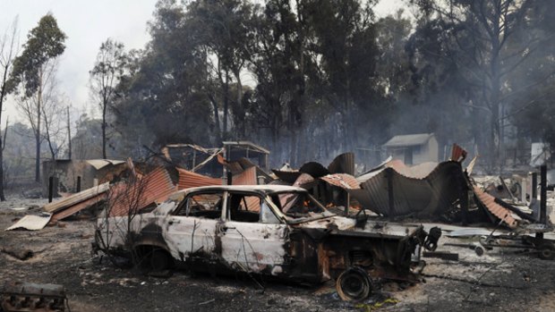 A house and car destroyed by fire that raged through Mackintosh's Road, Boolarra.