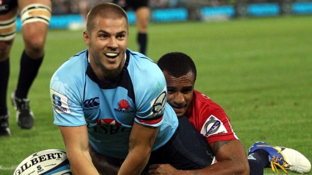 Familiar pose &#8230; Drew Mitchell crosses for a try against the Reds last season. However, Reds bounced back to take the Super Rugby title, while the Waratahs couldn’t maintain their early momentum.