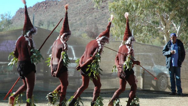 Aboriginal men dance during a three-day indigenous meeting to discuss ways of treating women better at Ross River, Central Australia.