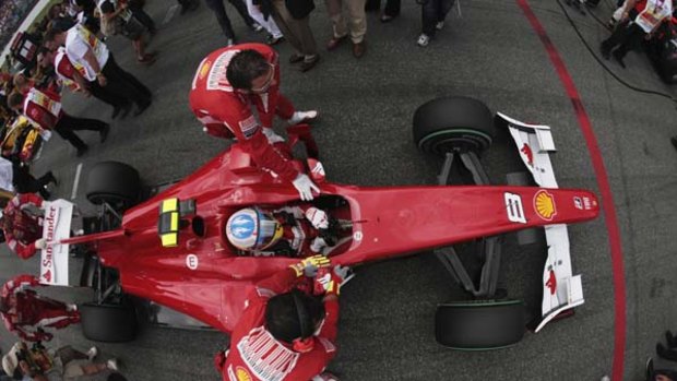 Limelight deprivation? . . . Ferrari's Fernando Alonso before the German Grand Prix at Hockenheim last weekend.