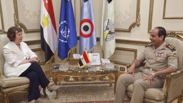 Egyptian army chief General Abdel Fattah al-Sisi  meets with EU foreign policy chief Catherine Ashton at the defence ministry headquarters in Cairo  on Monday.