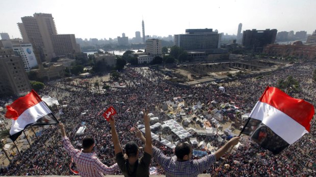 Egyptians protest against then-president Mohamed Mursi in Cairo's Tahrir Square in 2013.
