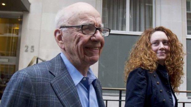 News Corporation chief Rupert Murdoch with Rebekah Brooks who has resigned as chief executive of News International in the wake of the hacking scandal.