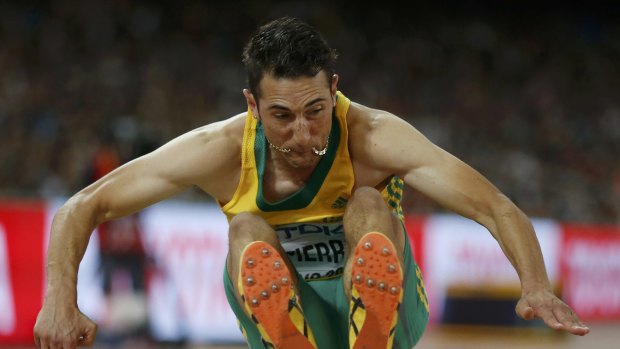 Fabrice Lapierre competes in the men's long jump final.