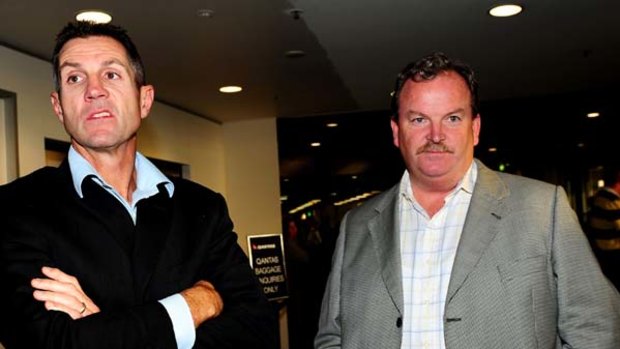 Canberra Raiders chief executive Don Furner (L) meets Joel Monaghan s managerJim Banaghan at Canberra airport  last night.