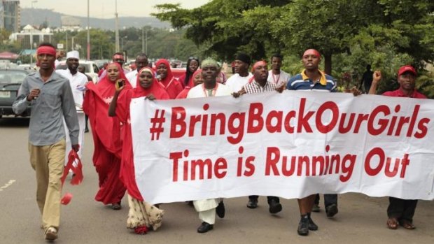 Campaigners march through Abuja calling for the release of the schoolgirls who were abducted by Boko Haram militants in April. 