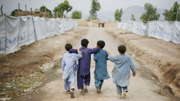 Pakistani children in a refugee camp in Peshawar, Pakistan.