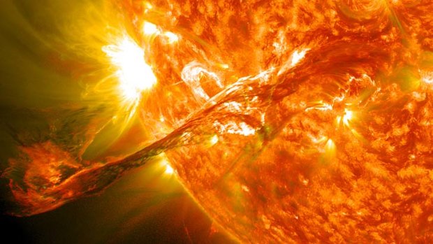 A  long filament of solar material that had been hovering in the sun's atmosphere, the corona, erupts out into space.