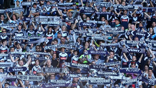 Melbourne Victory fans show their support during this year's A-League grand final.