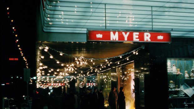 Shoppers in the 1950s admire the Myer Christmas windows.